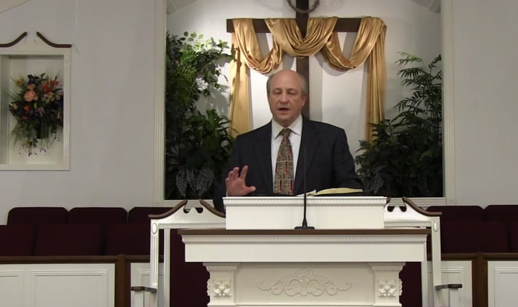 Pastor preaching from the pulpit at First Baptist Church of Wright City